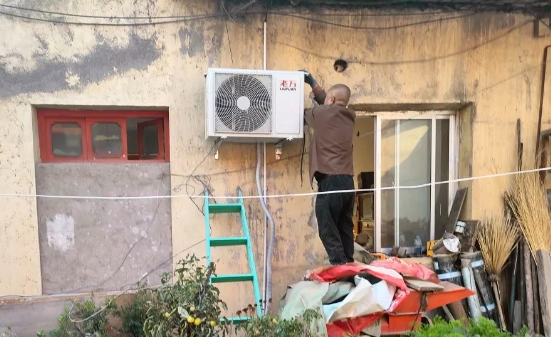 老万空气能为甘肃临夏州永靖县700户居民提供温暖保障
